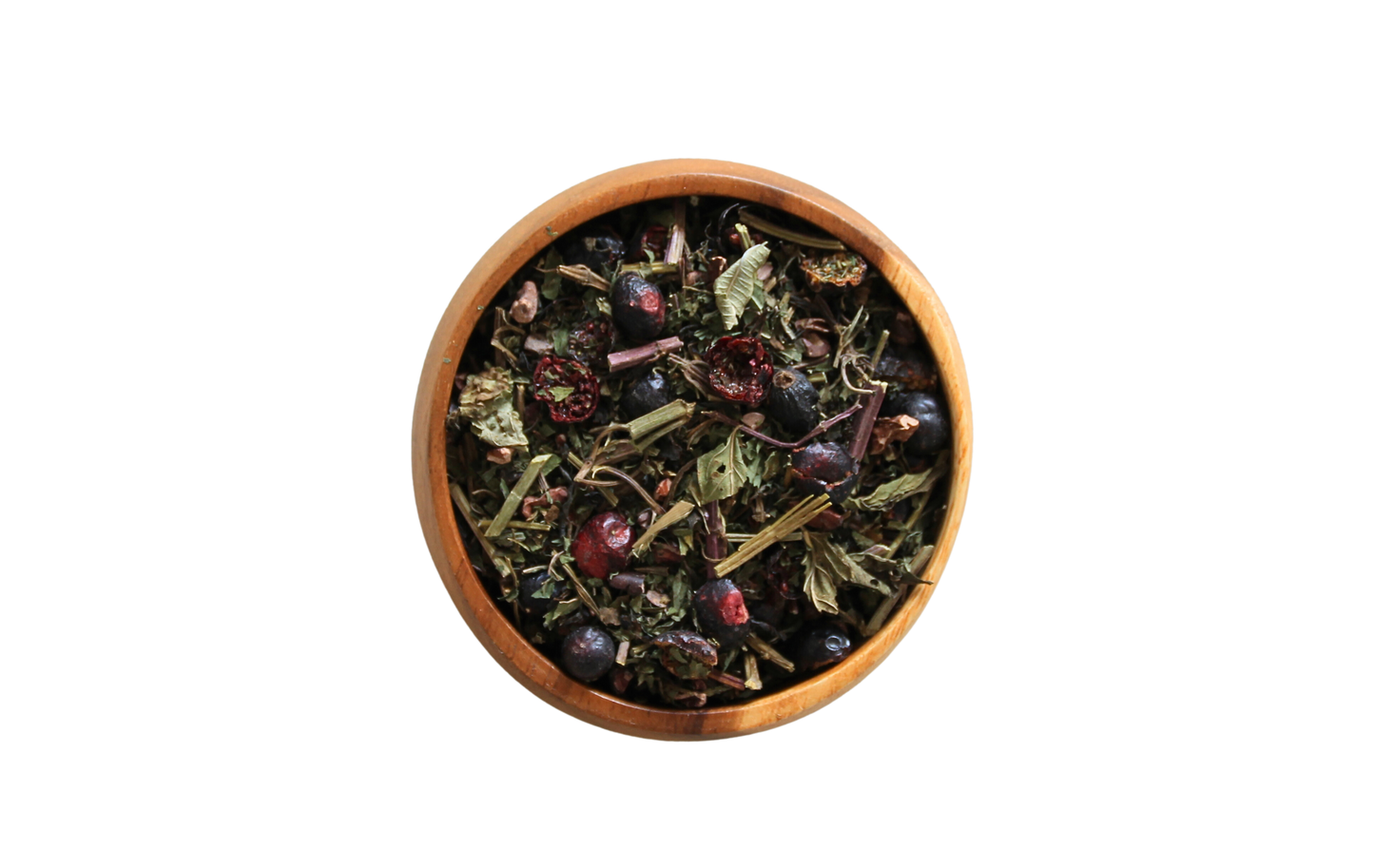 Amor loose tea leaves in a wooden bowl.