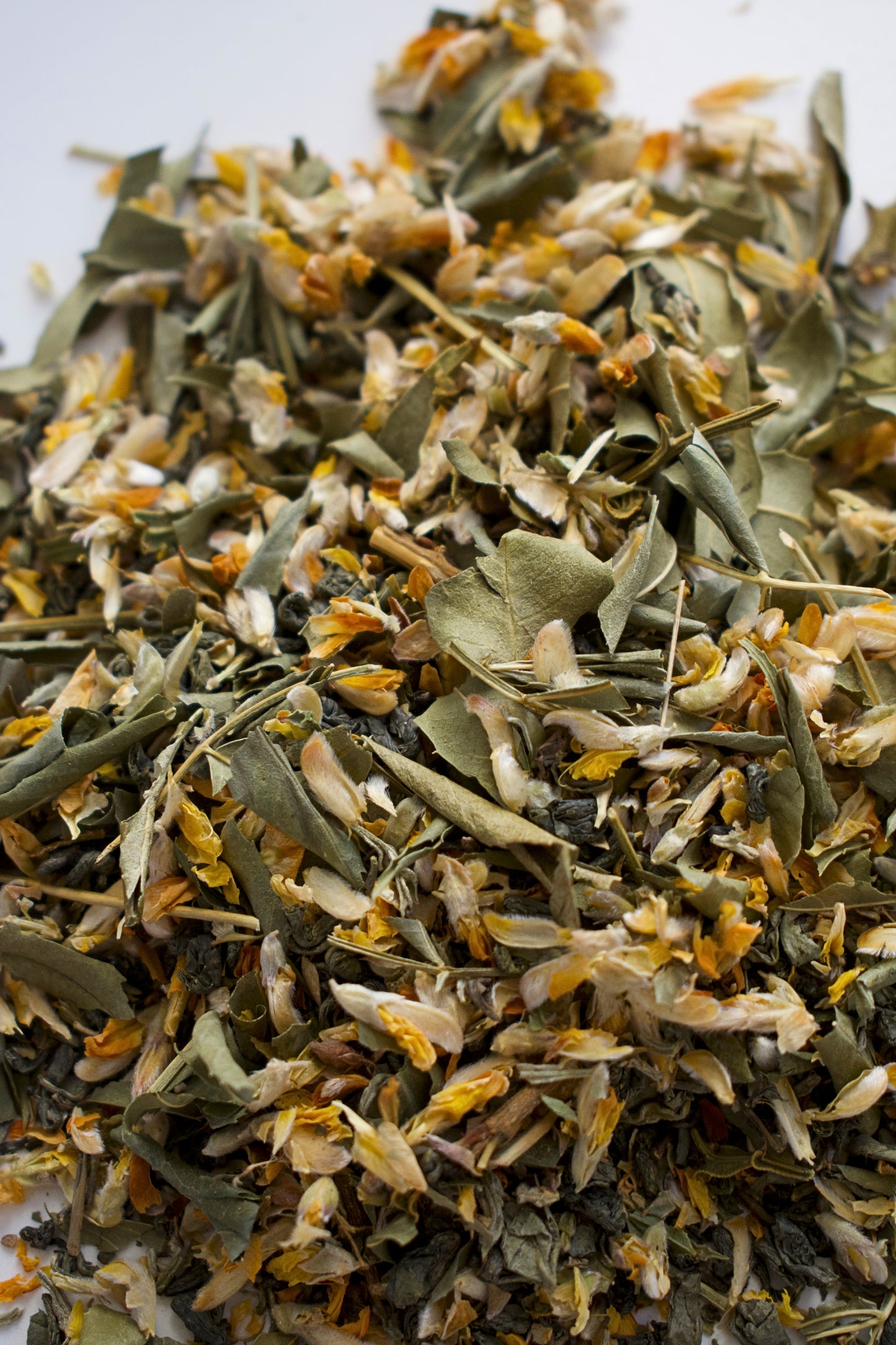 Cleanse loose leaves tea on a white background.