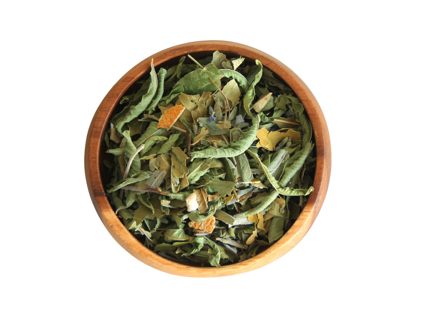 A top-down image of a wooden bowl filled with dried green and yellow herbal tea leaves.