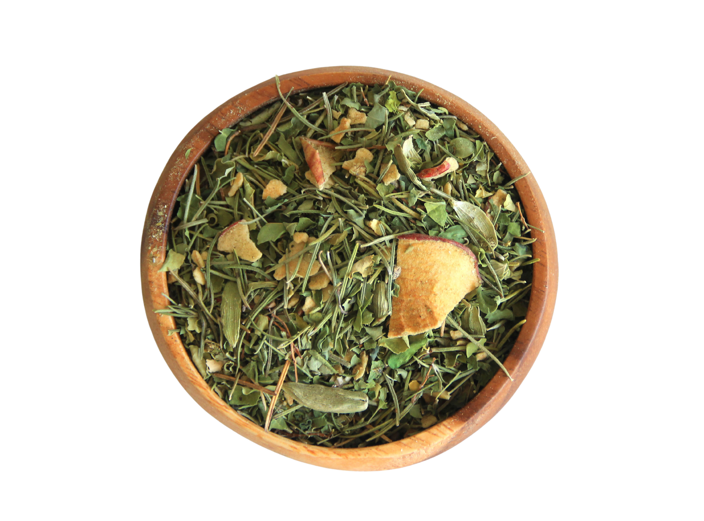 A wooden bowl filled with Mind Tonic loose leaves tea and dried apple.