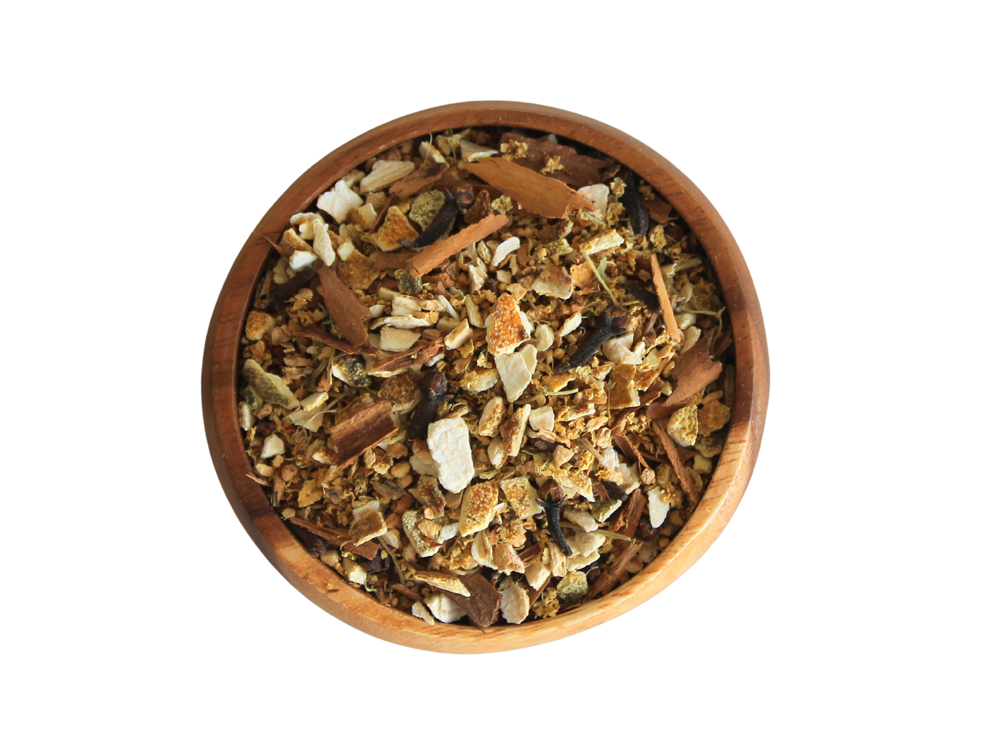 Rooted in fire herbal blend in wooden bowl.