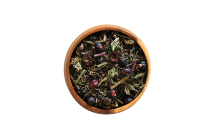 Amor loose tea leaves in a wooden bowl.