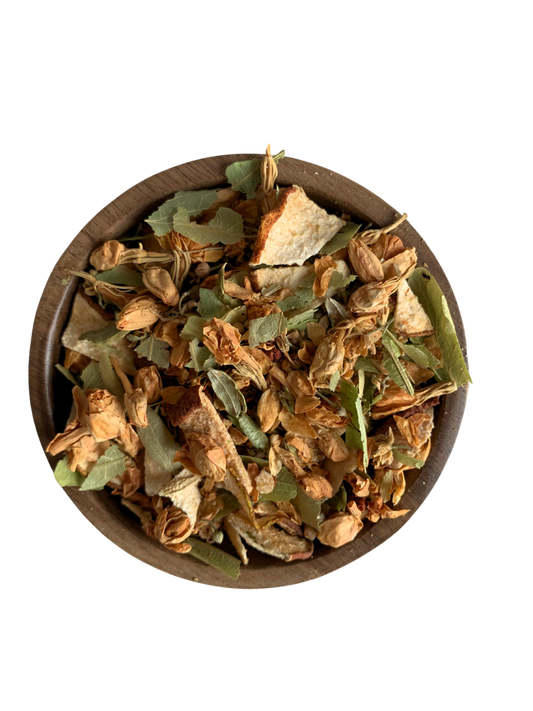 Loose leaves tea Jardim Sereno in a wooden bowl on a white background