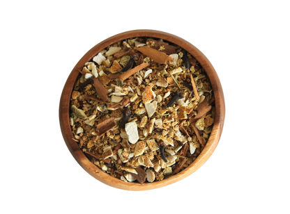 Rooted in fire herbal blend  in wooden bowl.