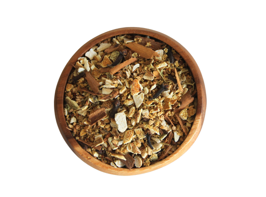 Rooted in fire herbal blend  in wooden bowl.